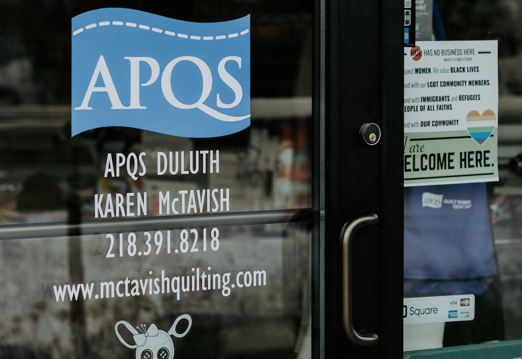 mctavish quilt studio storefront with APQS logo